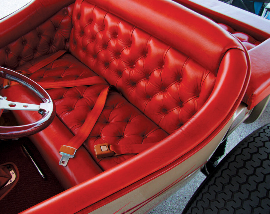 safeTboy Seat Belts installed in a red interior hot rod